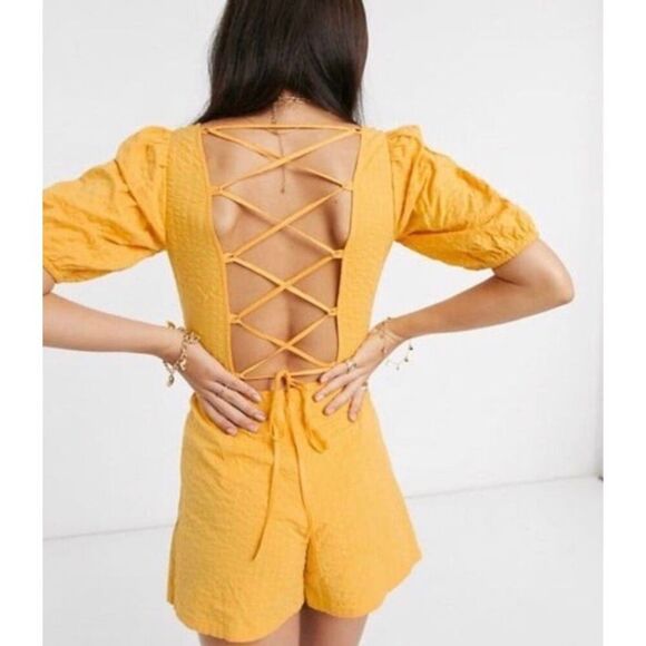 ASOS Yellow Seersucker Puff Sleeve Lace Up Back Romper - Picture 2 of 12
